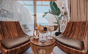 Delfini Beach Hotel & Suites